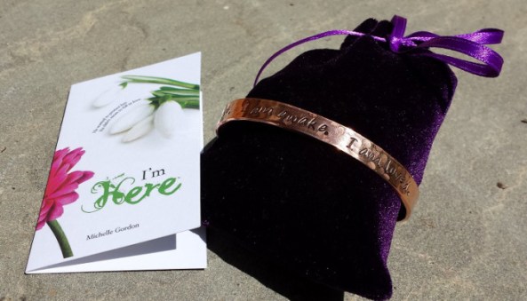 A handmade bracelet featuring a quote from The Elphite.